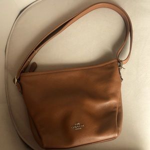 PreLoved Coach leather medium size handbag.